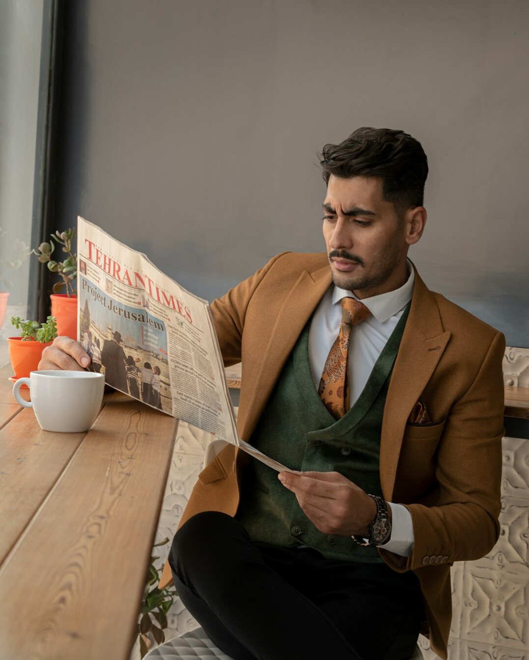 newspaper reading in cafe