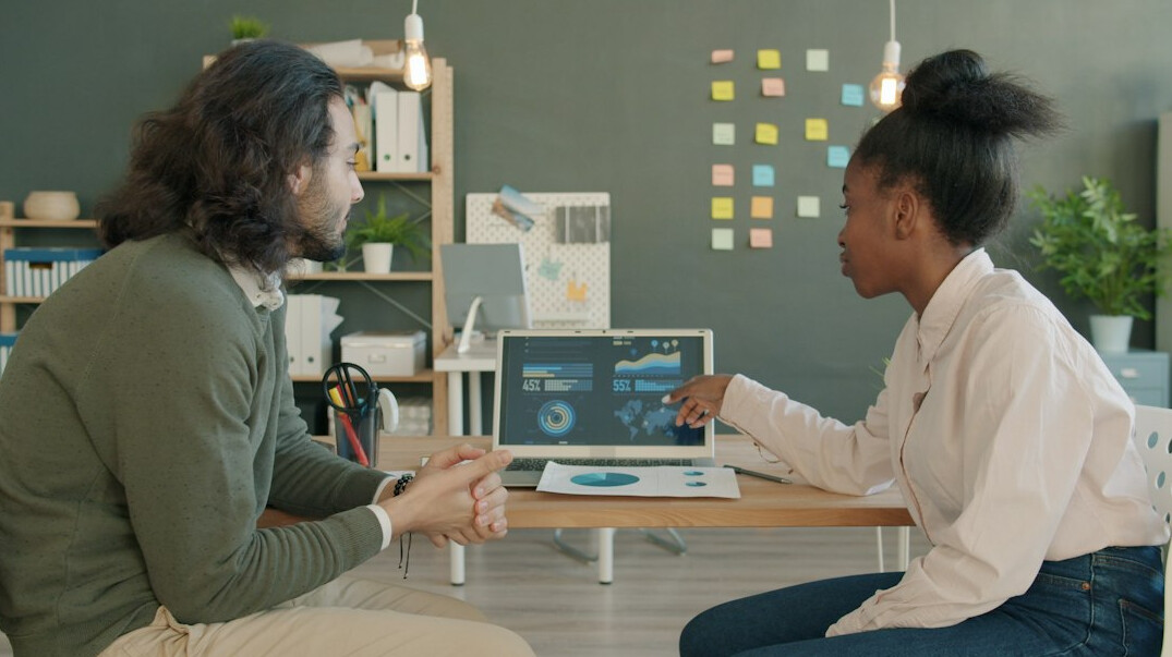 researchers analyzing data charts